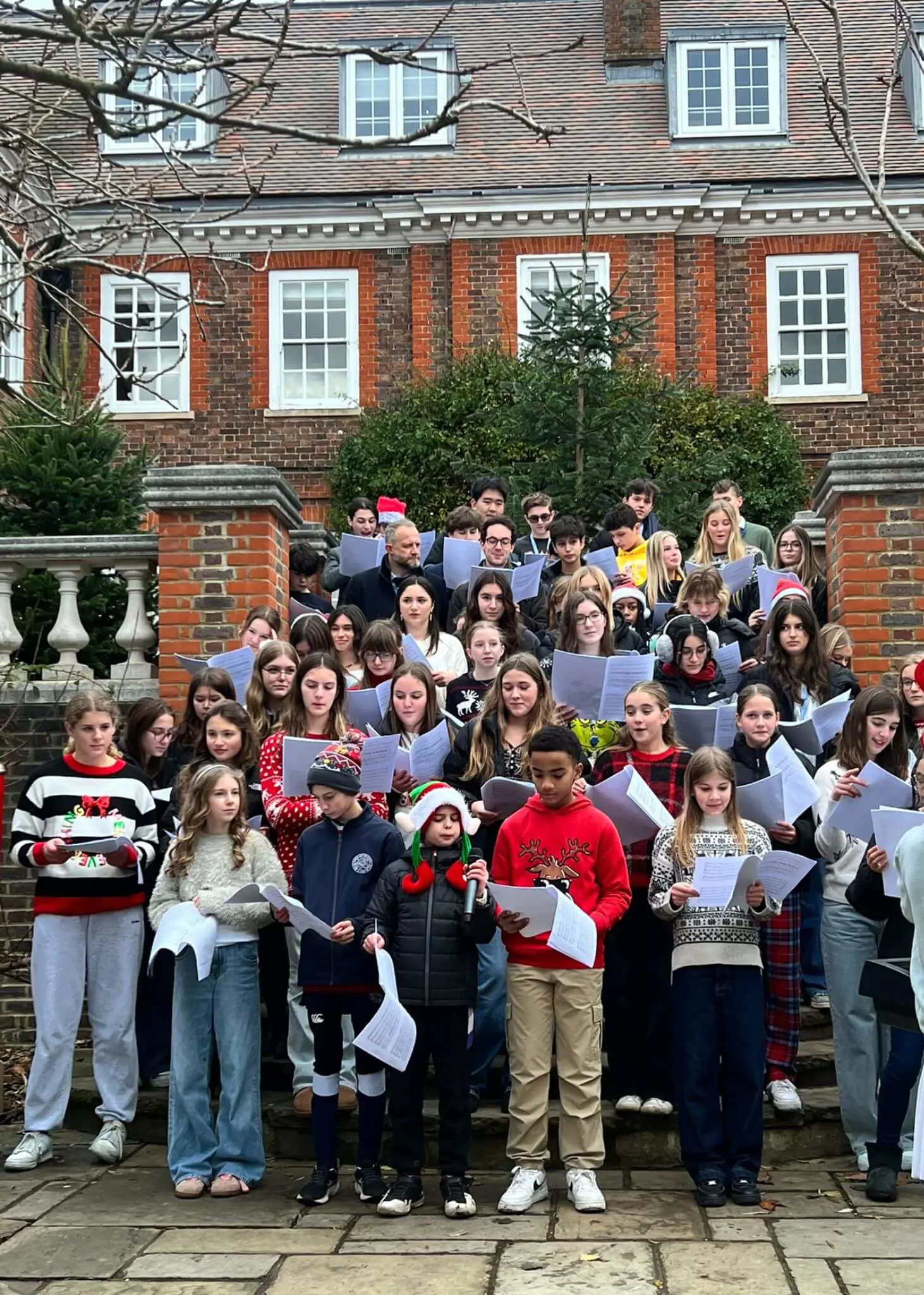 Senior pupils singing in a choir | Ibstock Place School, Roehampton, Private School Near Richmond, Barnes, Putney, Kingston, & Wandsworth 