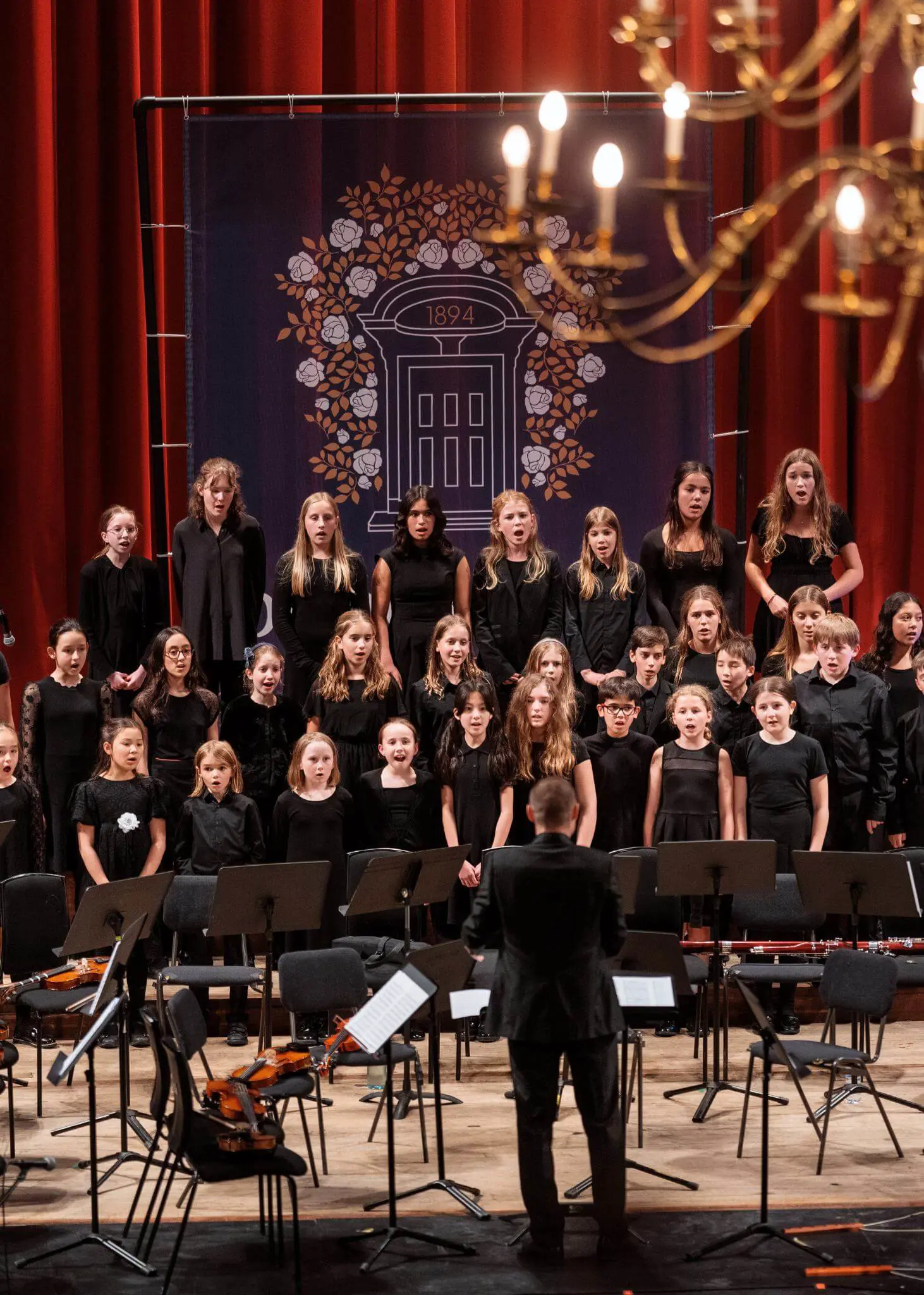 Prep pupils in a choir, Ibstock Place School private school near Richmond, Barnes, Putney, Kingston, and Wandsworth on an overseas trip. 