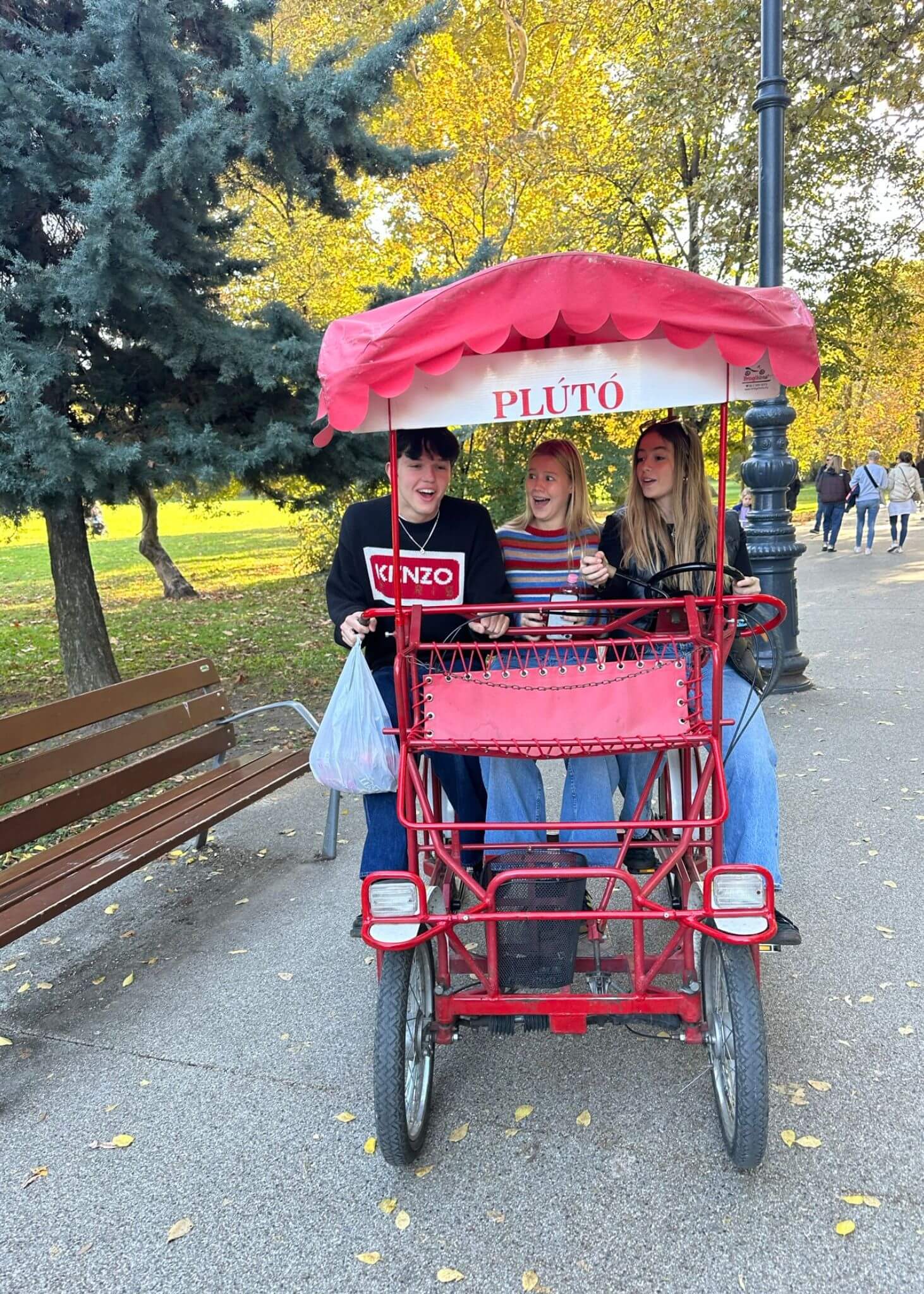 Ibstock Singers riding a bike in Budapest | Ibstock Place School, Roehampton, Private School Near Richmond, Barnes, Wandsworth, Putney, Kingston.