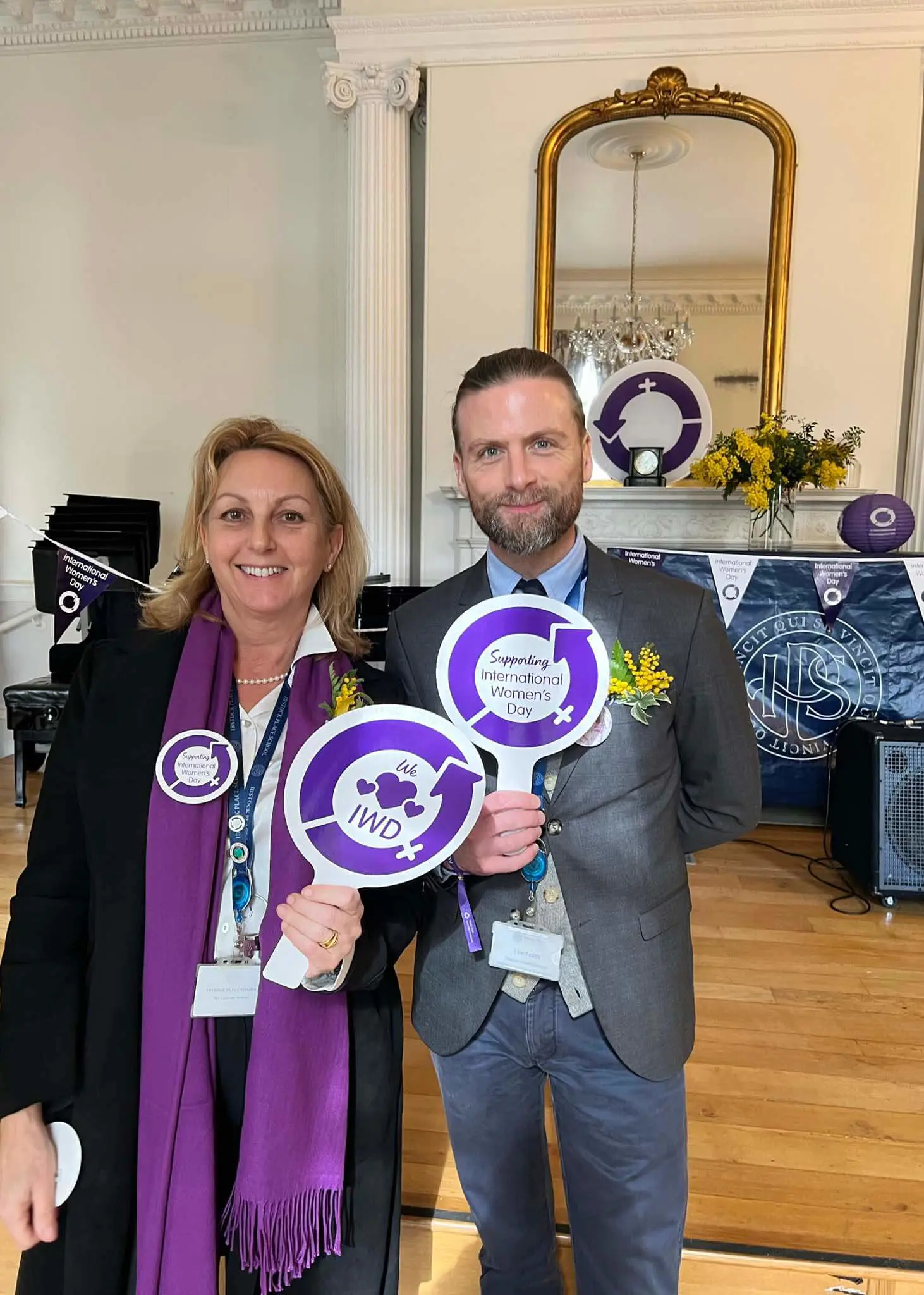 Staff Celebrating International Women's Day by wearing purple at Ibstock Place School, Roehampton, a private school near Richmond, Barnes, Putney, Kingston, & Wandsworth