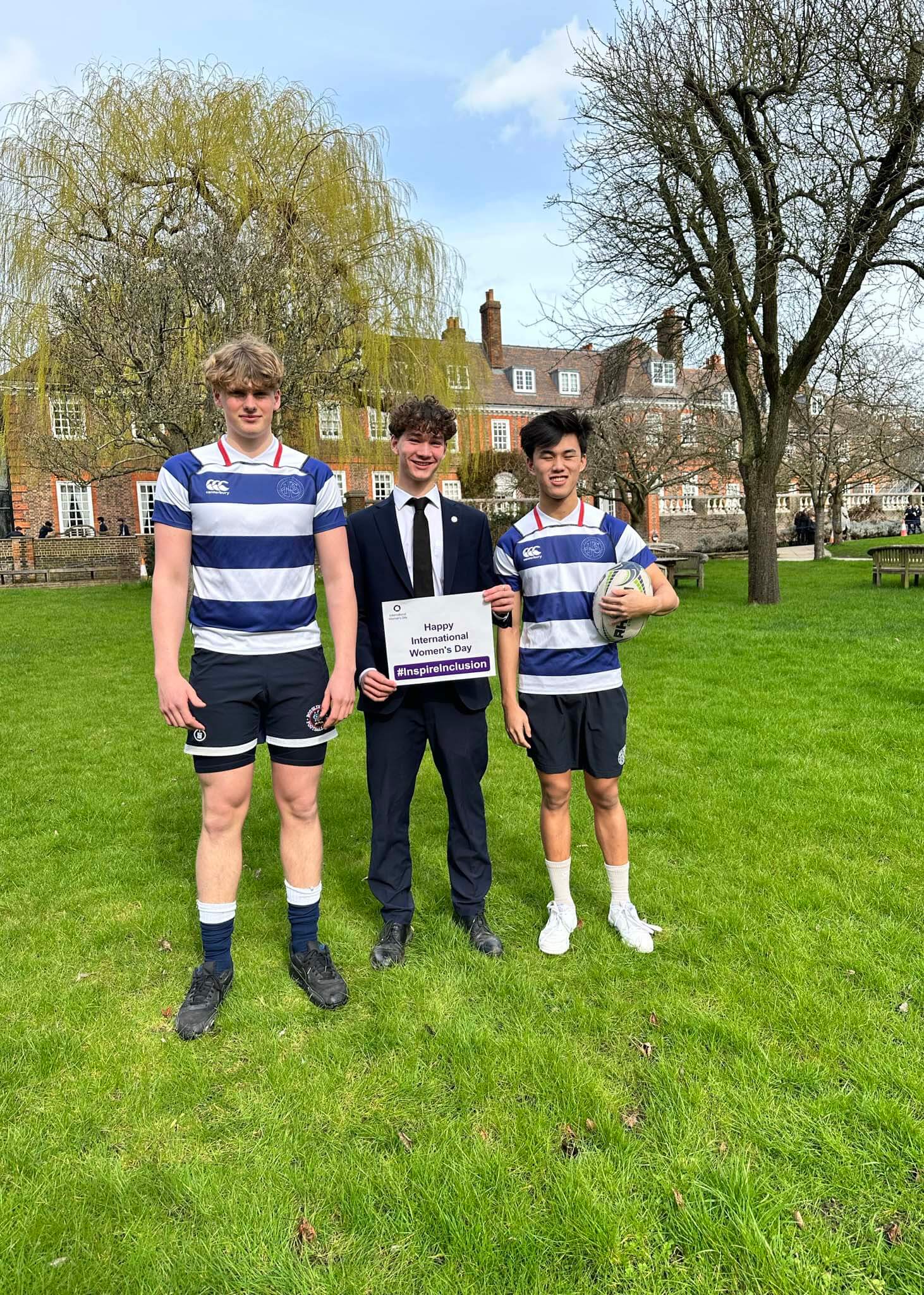 Rugby boys team celebrating International Women's day at Ibstock Place School, Roehampton, a private school near Richmond, Barnes, Putney, Kingston, & Wandsworth