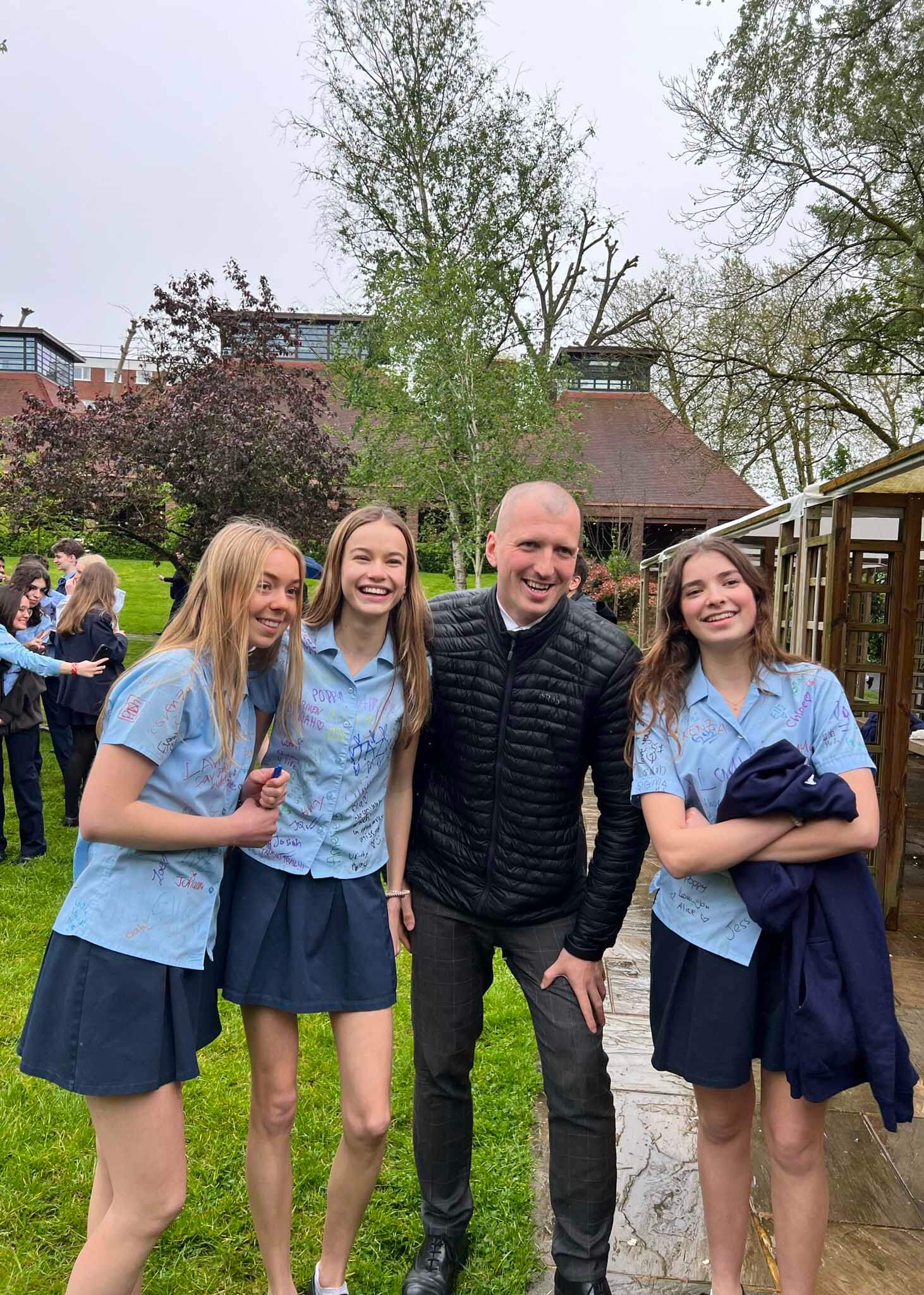 Senior 11 pupils with their teacher on their last day at  Ibstock Place School, a private school near Richmond, Barnes, Putney, Kingston, and Wandsworth on an overseas trip. 