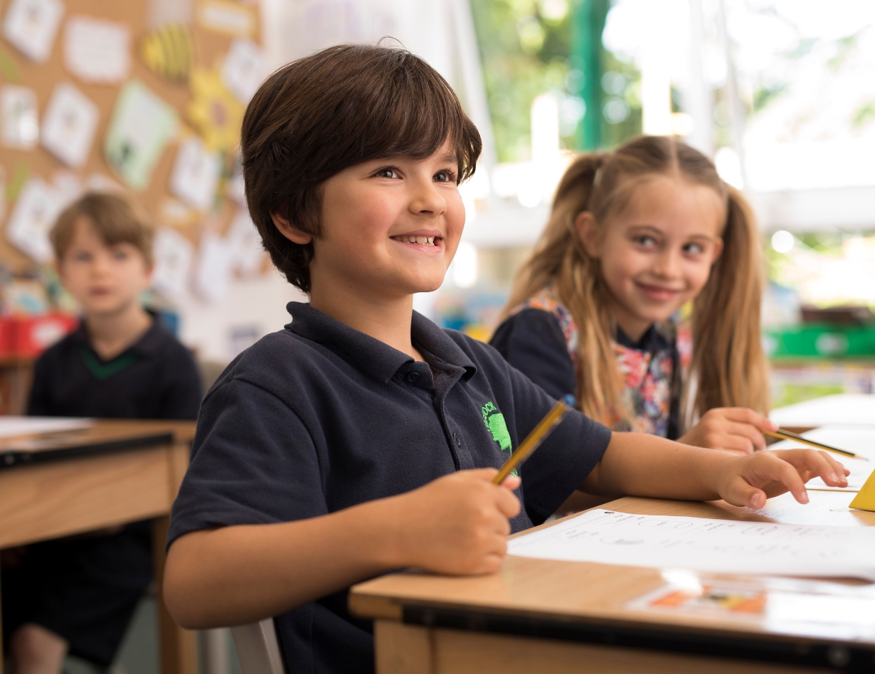 Pre-prep pupils studying in the classroom at Ibstock Place School, a private school near Richmond