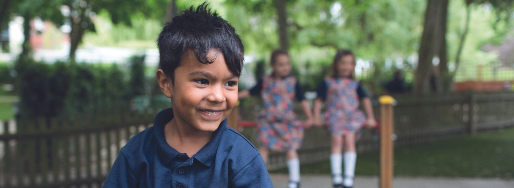 prep pupils playing in the playground of Ibstock Place School, a private school near Richmond.