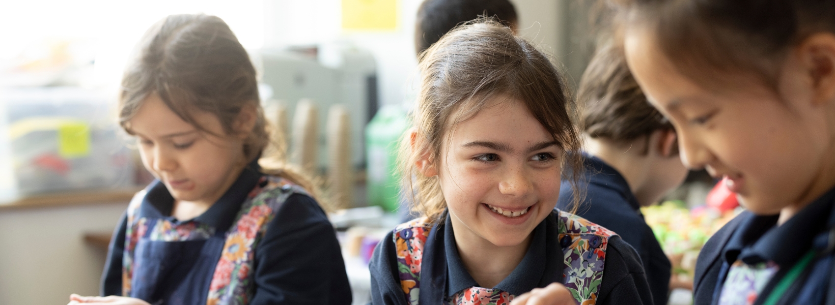 prep pupils smiling and having fun the classroom of Ibstock Place School, a private school near RichmondP