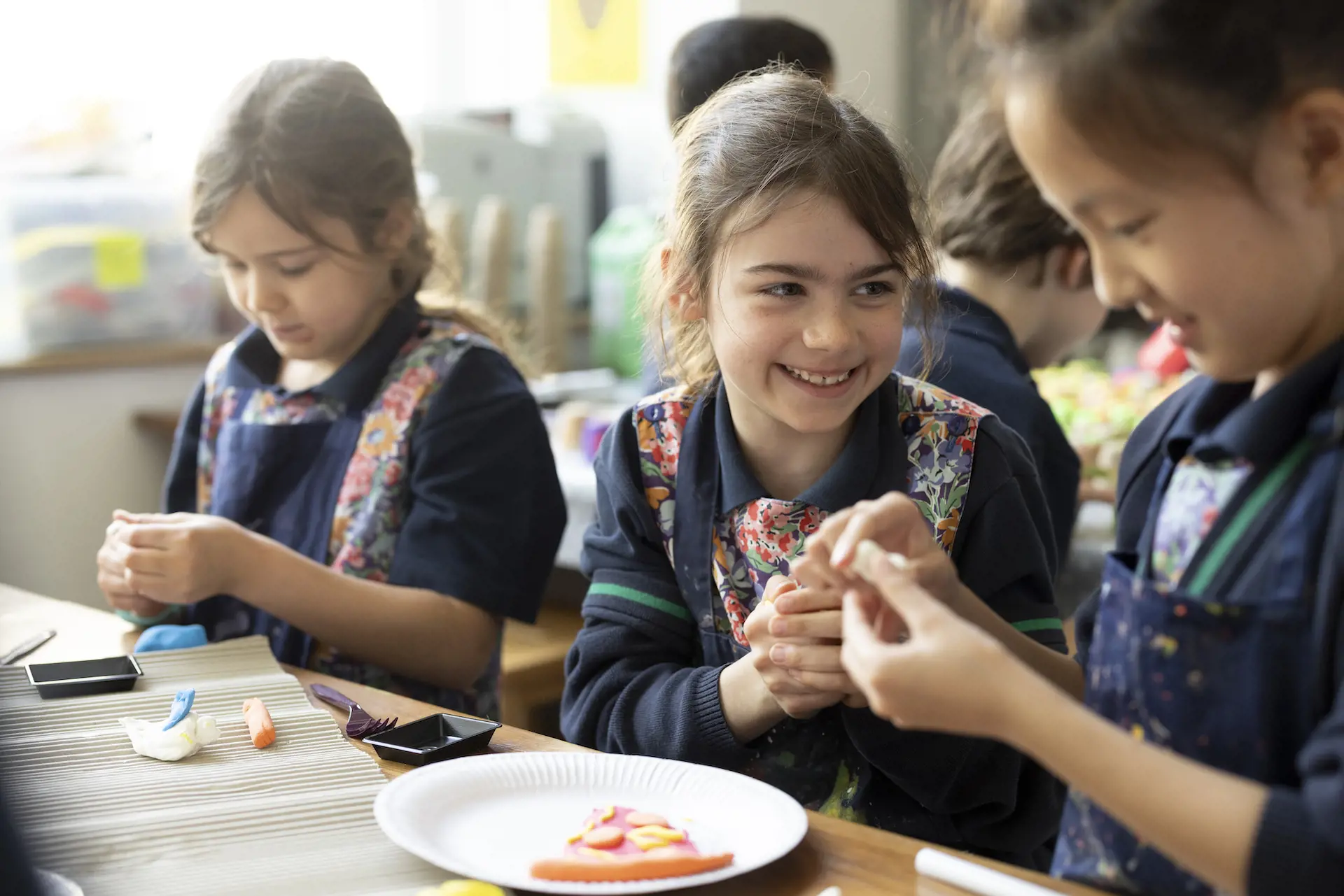 prep pupils making clay food at Ibstock Place School, a private school near Richmond.