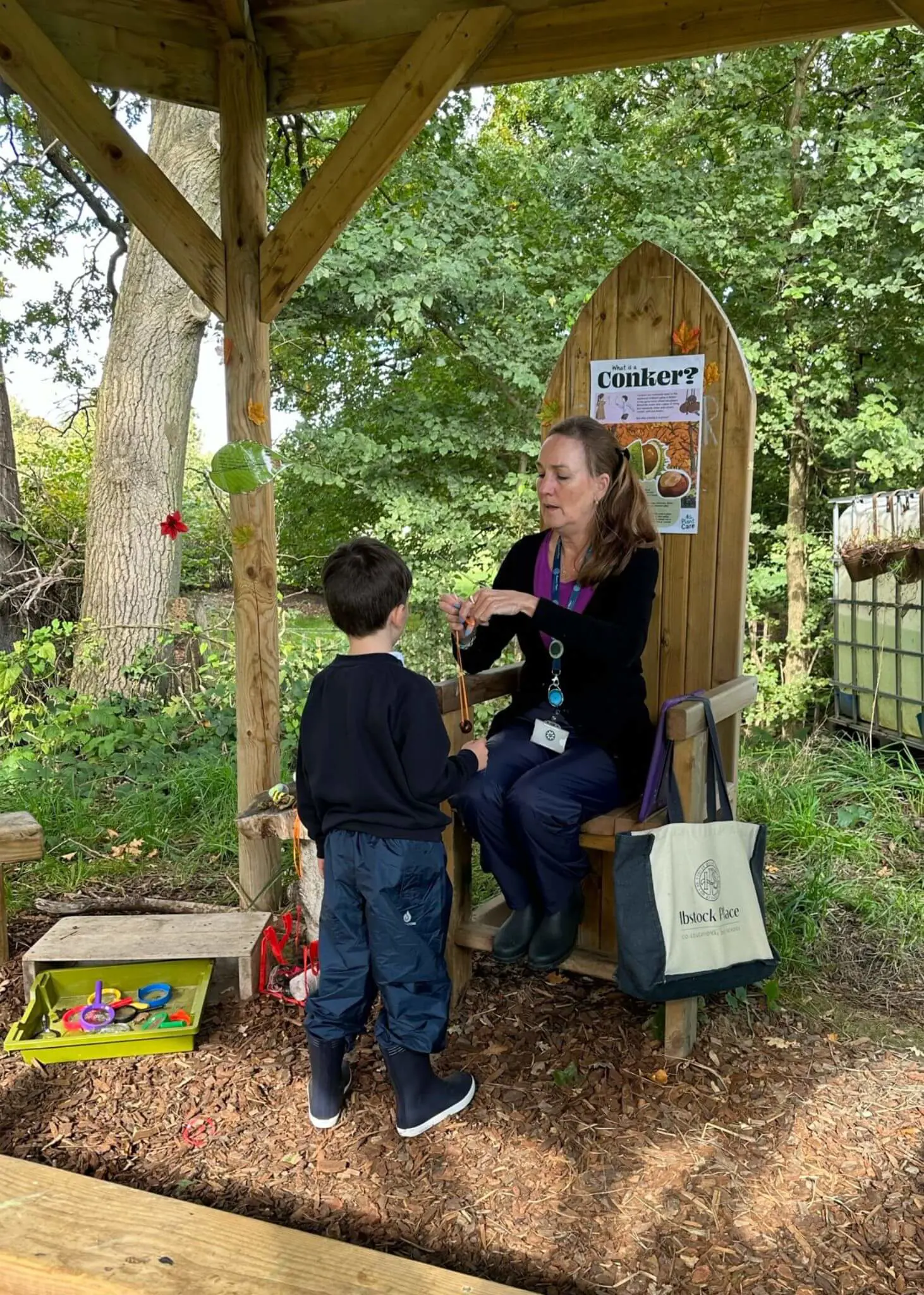 Pre-prep pupils playing with conkers, Ibstock Place School a private school near Richmond, Barnes, Putney, Kingston, and Wandsworth on an overseas trip. 