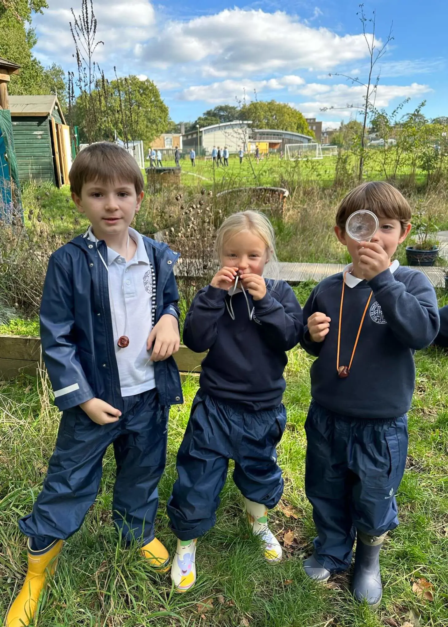 Pre-prep pupils playing with conkers, Ibstock Place School a private school near Richmond, Barnes, Putney, Kingston, and Wandsworth. 