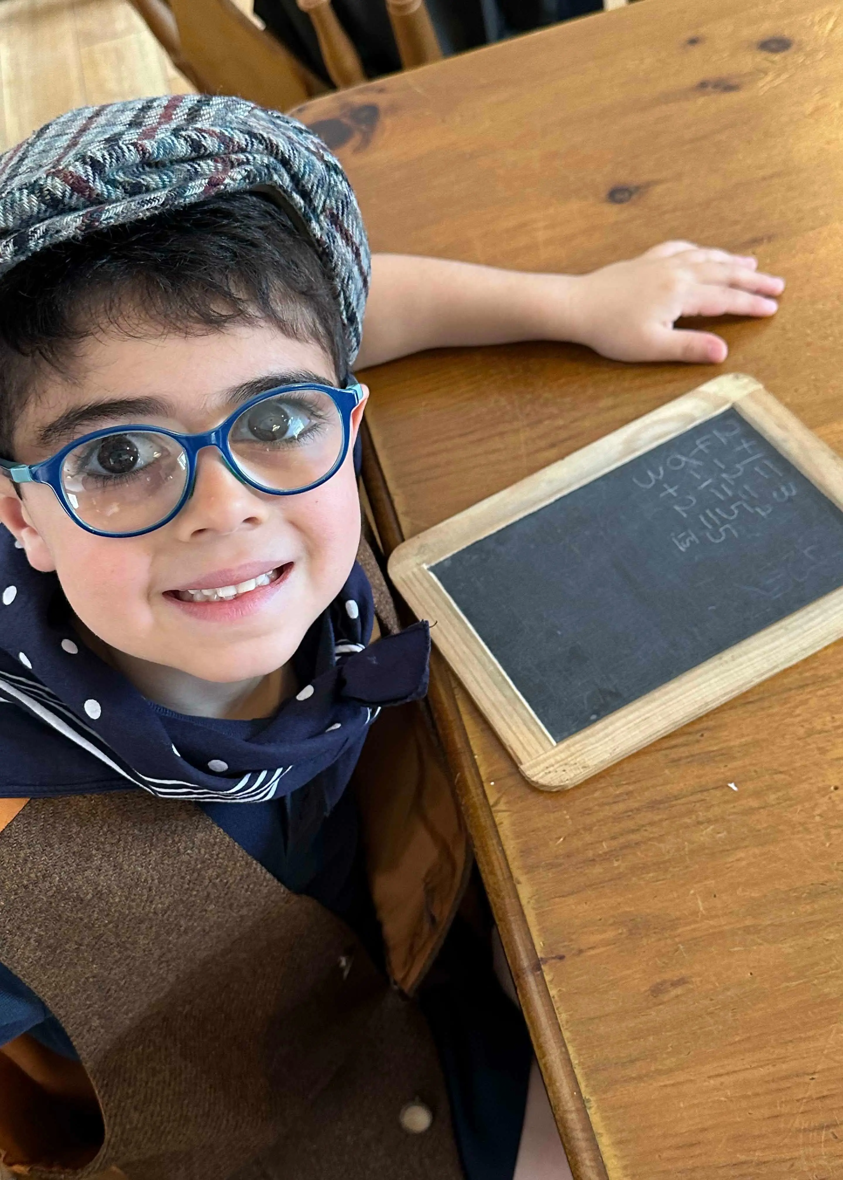 Prep 1 pupil learning about victorian times education system | Ibstock Place School, a private school near Richmond, Barnes, Putney, Kingston, and Wandsworth on an overseas trip. 