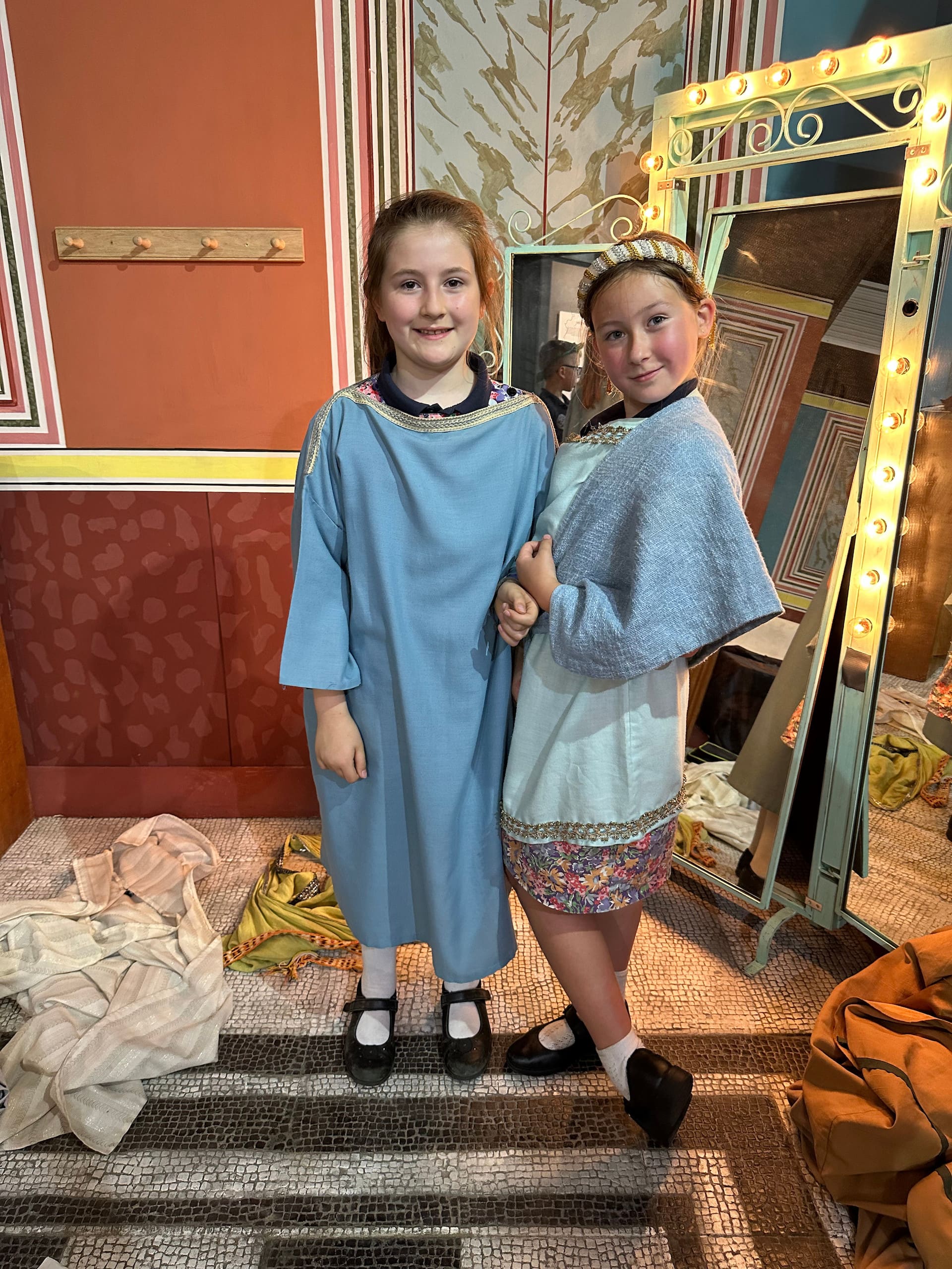 prep pupils dressed up in traditional clothes at a trip.