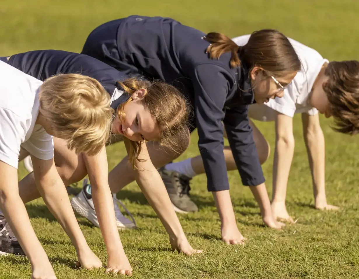 Prep pupils running at sports day at Ibstock Place School, a private school near Richmond.