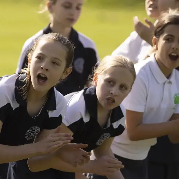 Prep pupils cheering their classmates at sports day at Ibstock Place School, a private school near Richmond.