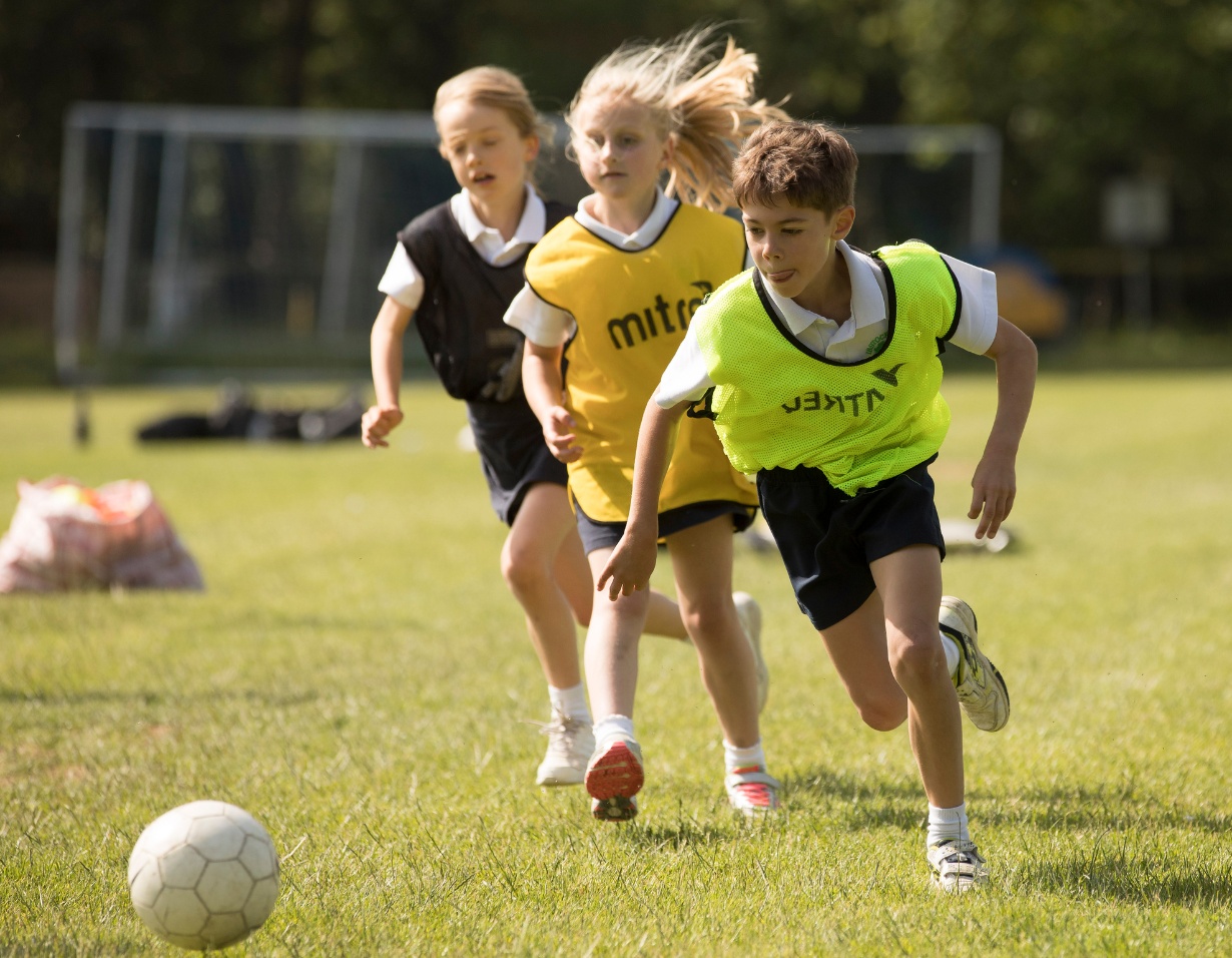 Welcome to Ibstock Place School, a leading private school in South-West London, Near Richmond, Barnes, Putney, Kingston, & Wandsworth for children ages 4-18 years. Prep pupils playing football at Ibstock Place School, a private school near Richmond.