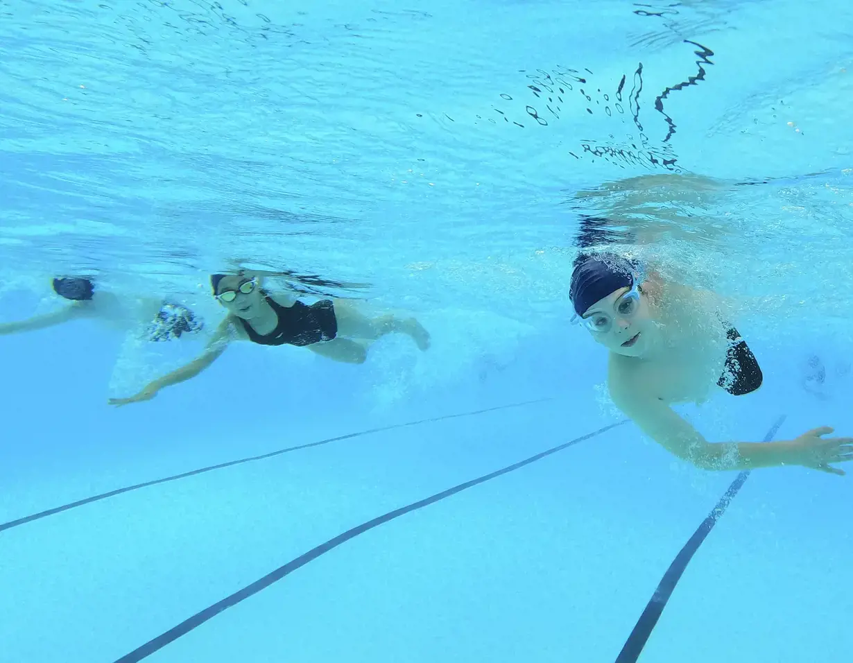 Welcome to Ibstock Place School, a leading private school in South-West London, Near Richmond, Barnes, Putney, Kingston, & Wandsworth for children ages 4-18 years. Prep pupils doing underwater swimming at Ibstock Place School, Near Richmond.