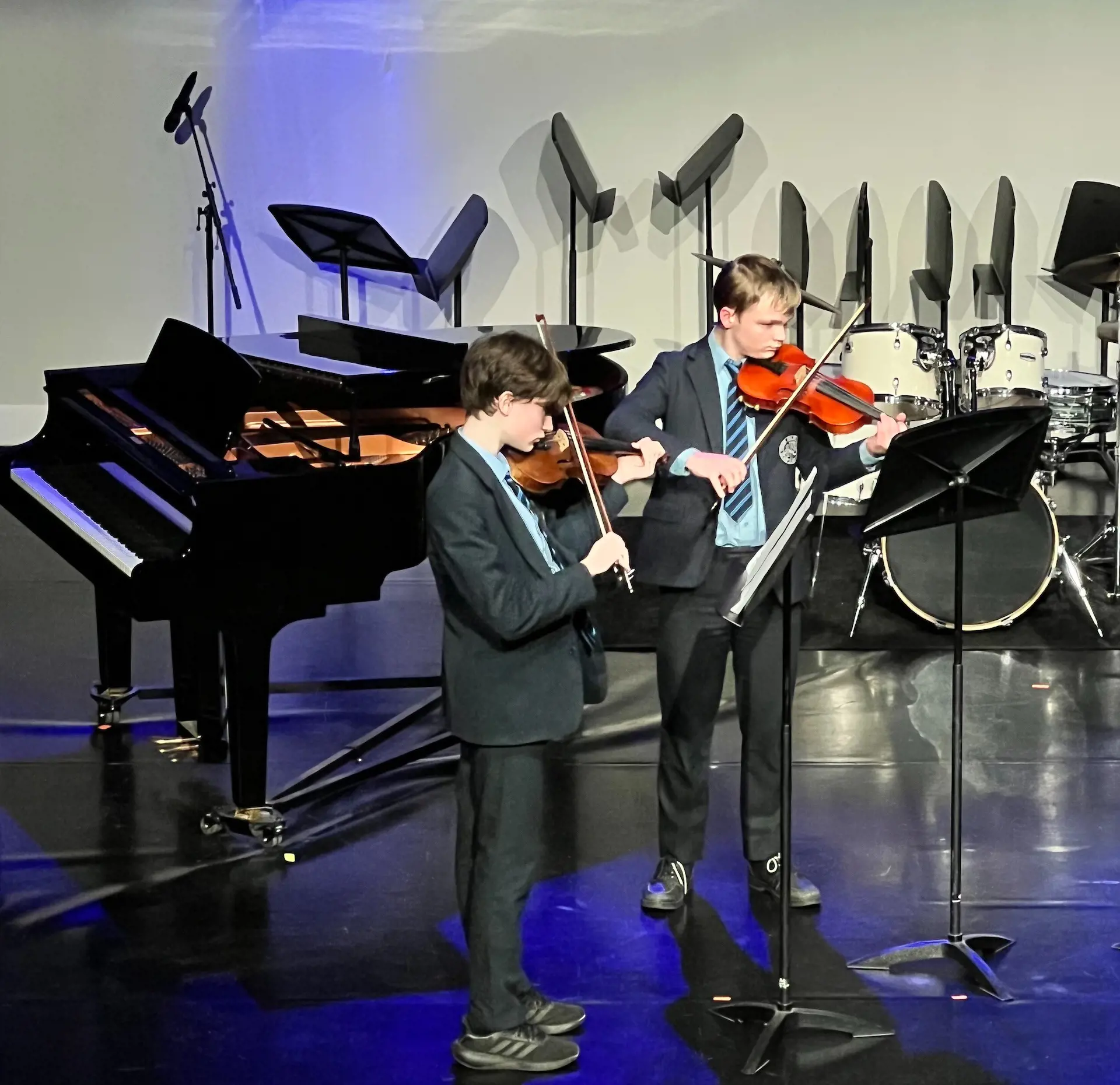 Senior pupils playing a musical instrument at Ibstock Place School, a private school near Richmond, Barnes, Putney, Kingston, and Wandsworth.