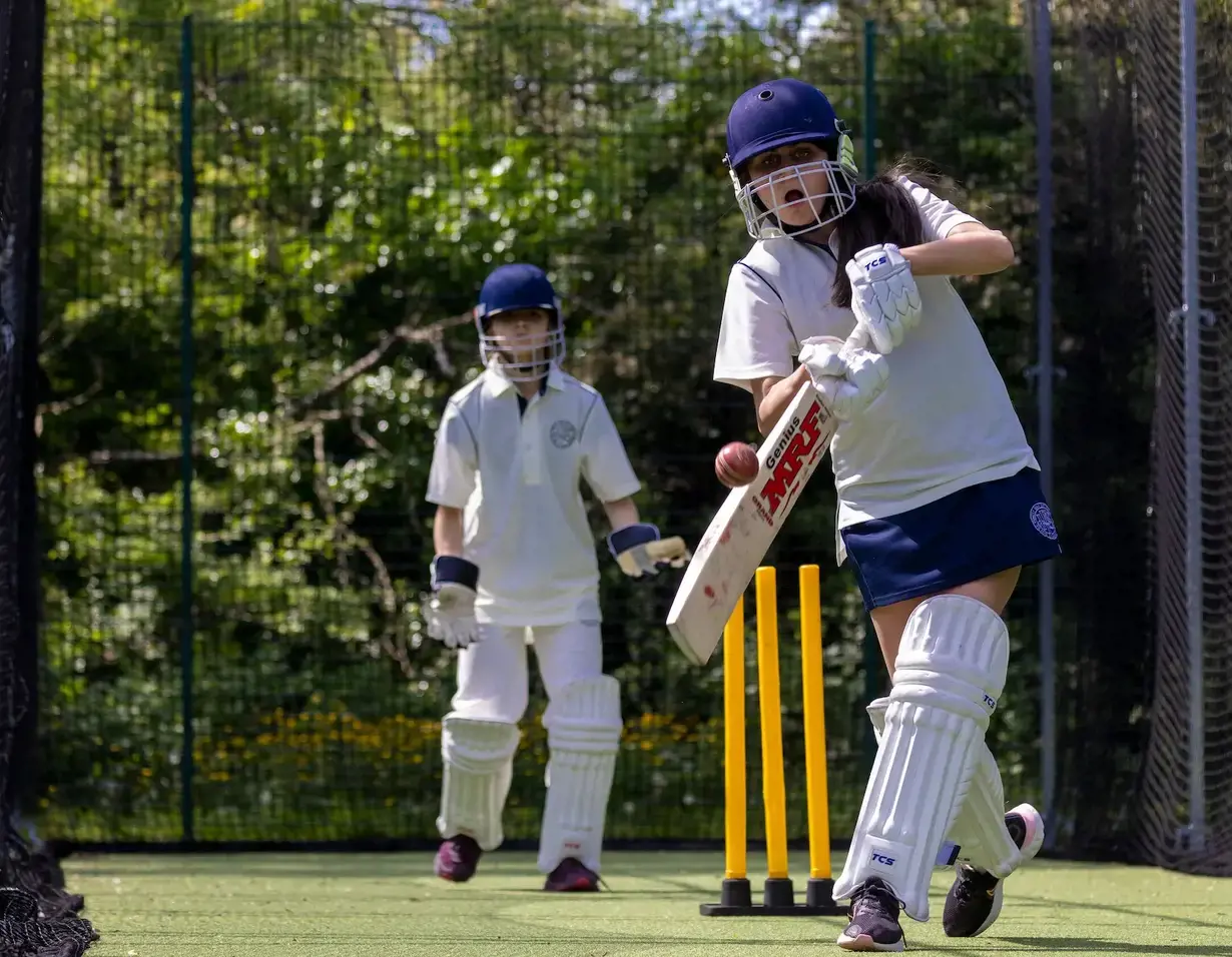 Senior pupils playing cricket at Ibstock Place School, a private school near Richmond, Barnes, Putney, Kingston, and Wandsworth