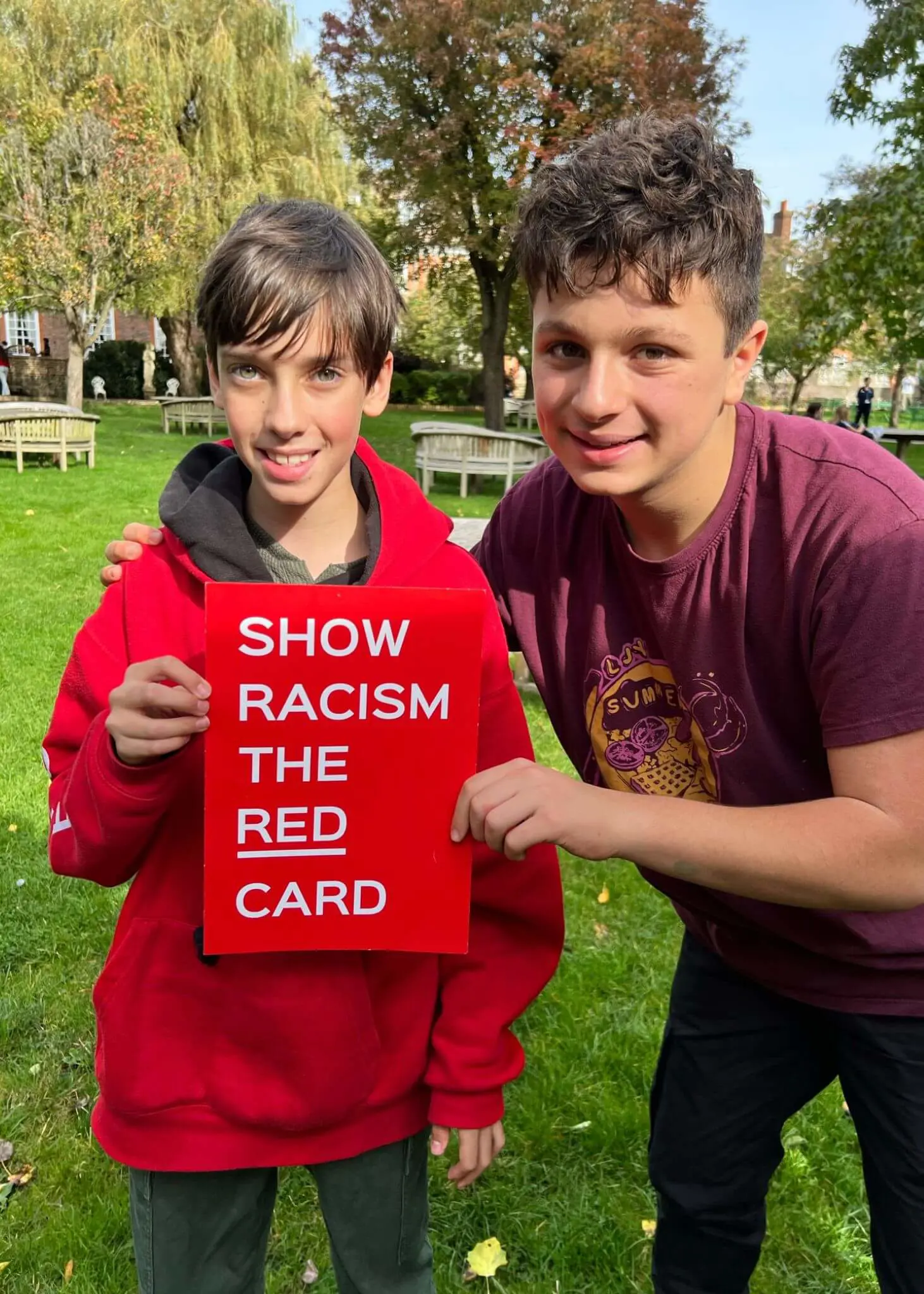 upils wearing red at Ibstock Place School, a private school near Richmond, Barnes, Putney, Kingston, and Wandsworth.