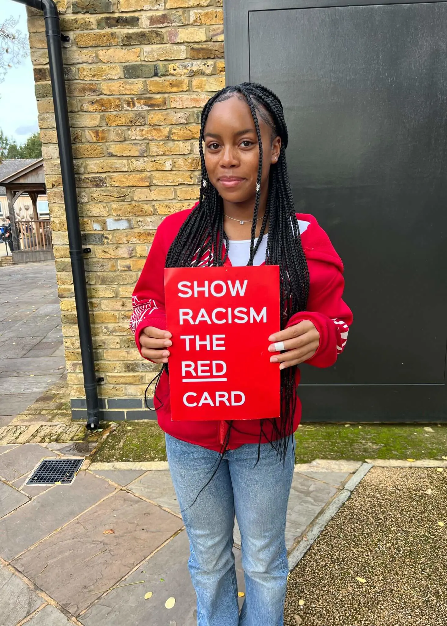 Pupils wearing red at Ibstock Place School, a private school near Richmond, Barnes, Putney, Kingston, and Wandsworth. 