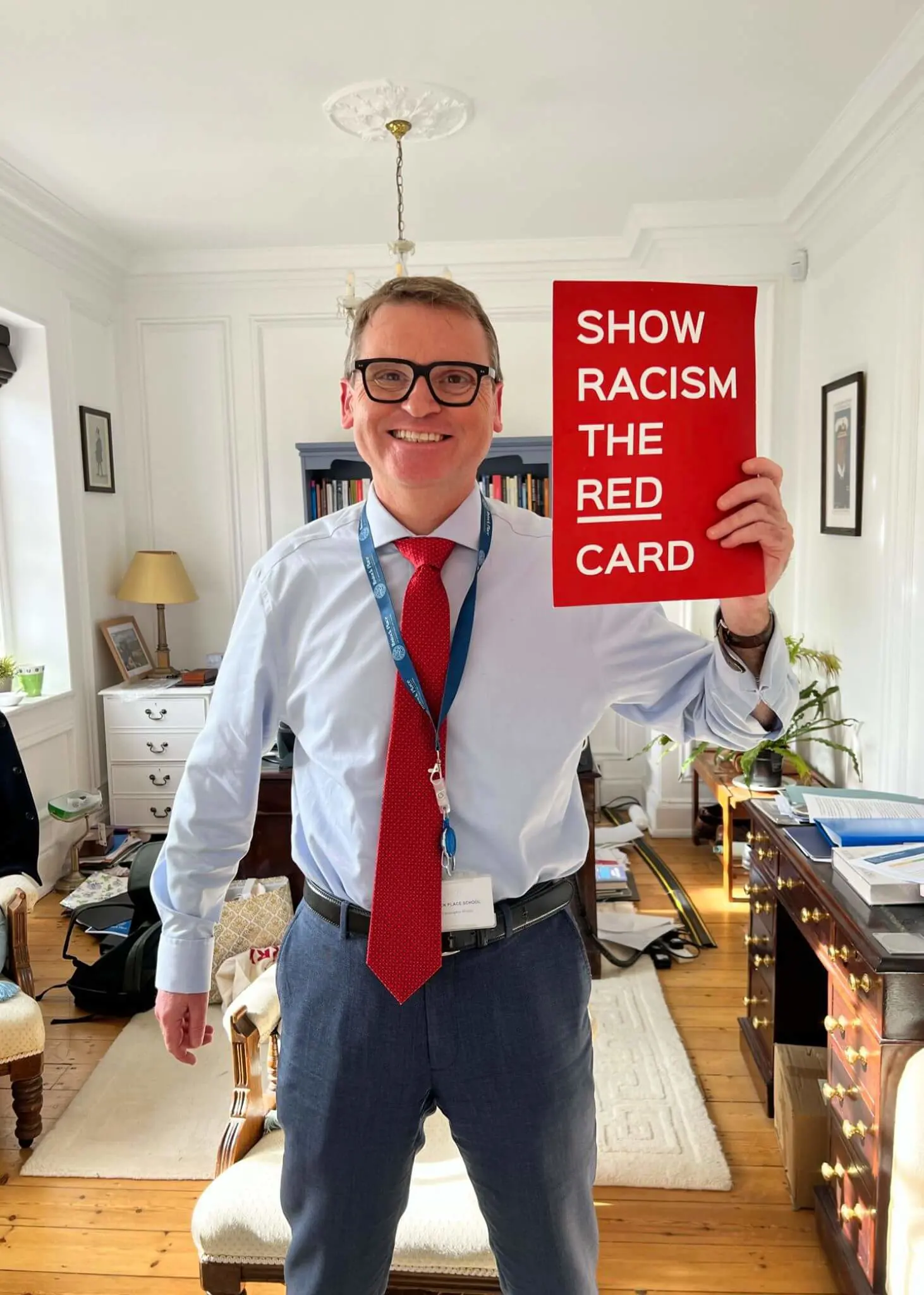 Pupils wearing red at Ibstock Place School, a private school near Richmond, Barnes, Putney, Kingston, and Wandsworth.