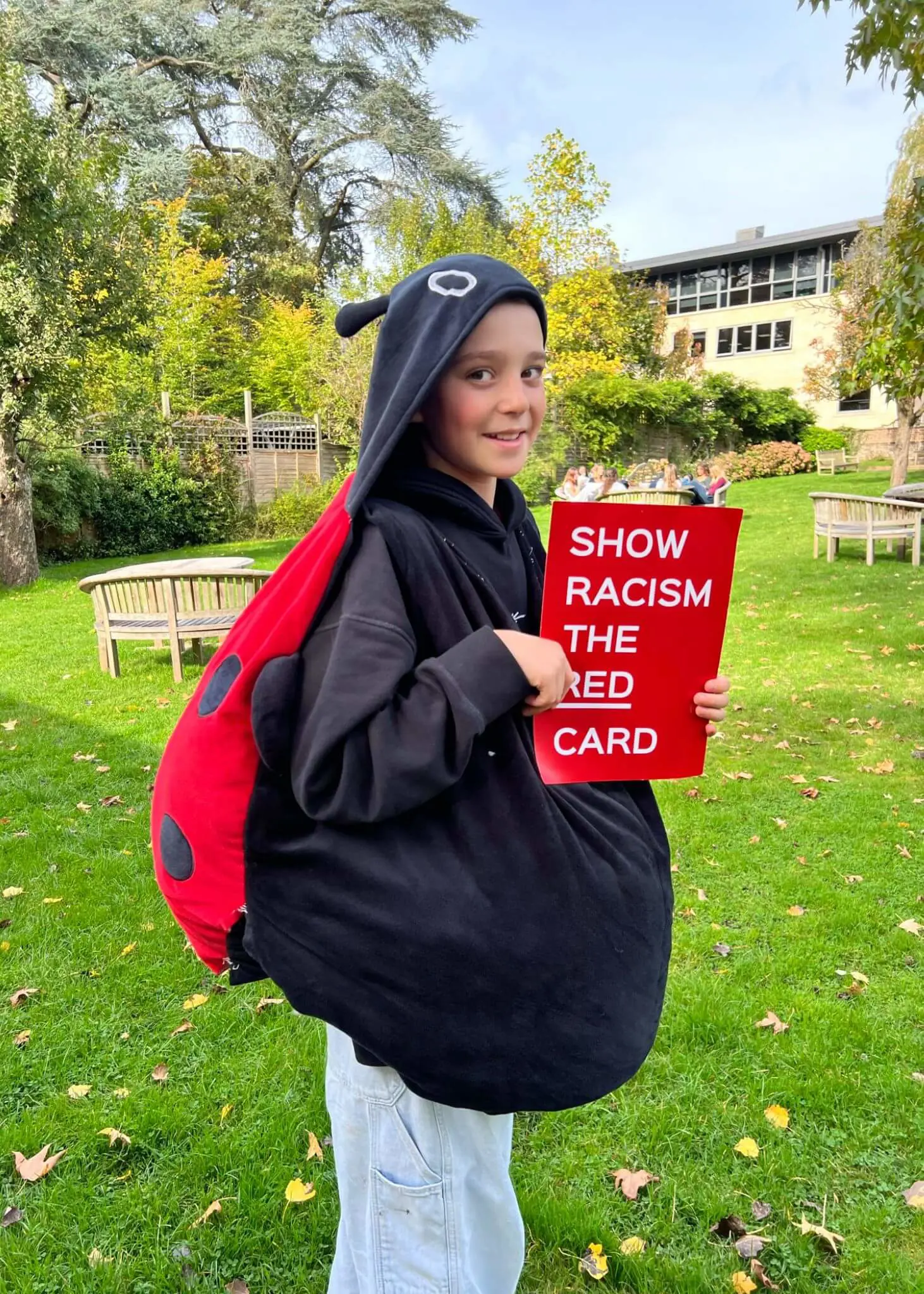 upils wearing red at Ibstock Place School, a private school near Richmond, Barnes, Putney, Kingston, and Wandsworth.