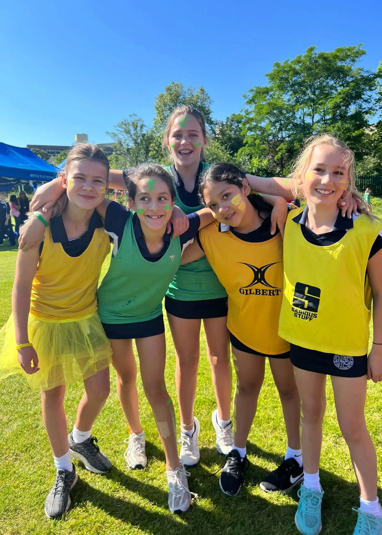 Track and Field Day, pupils dressed up in their house colours | Ibstock Place School, Roehampton, Private School Near Richmond, Barnes, Putney, Kingston, & Wandsworth 