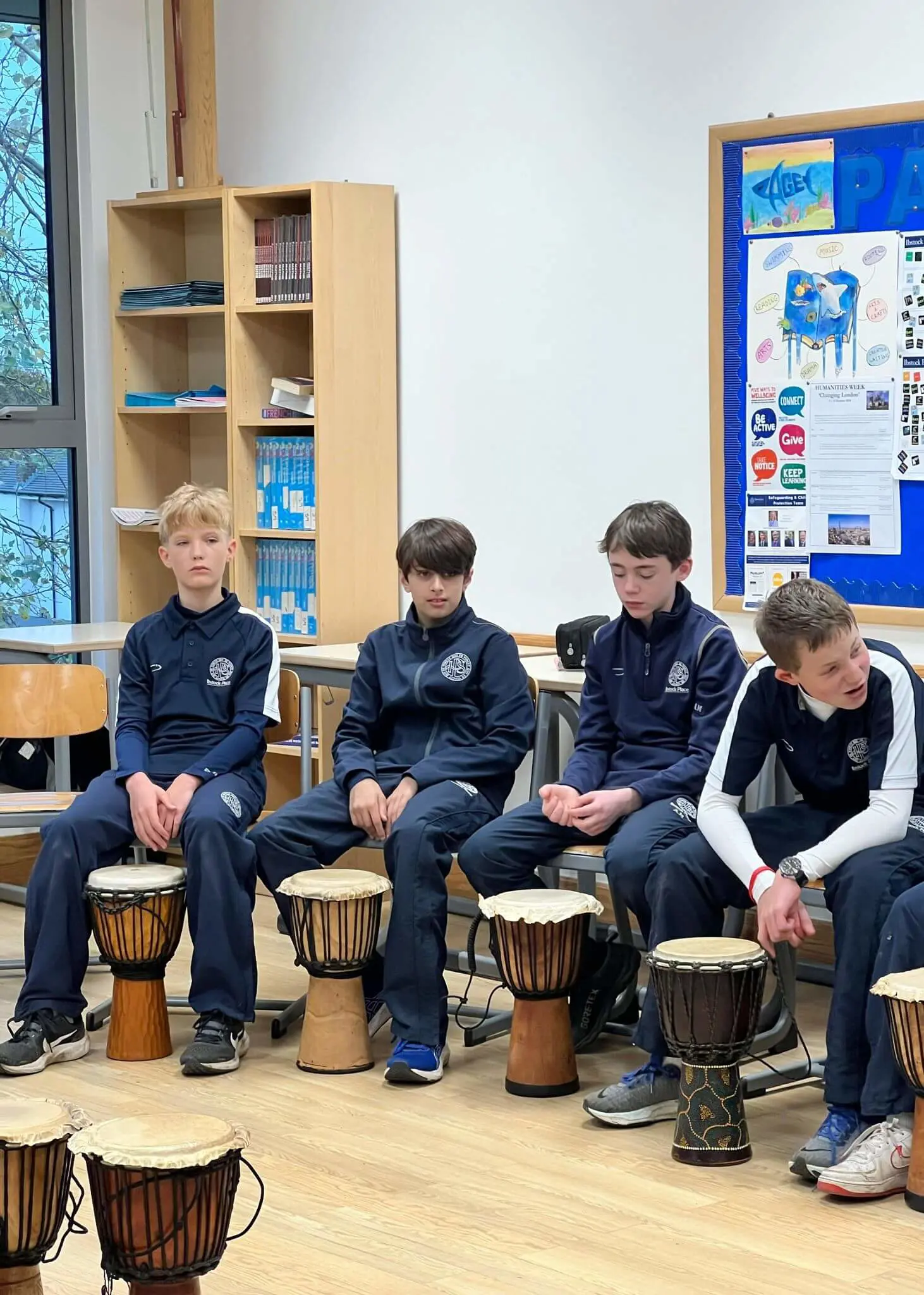 Senior pupils learning African drums | Ibstock Place School, a private school near Richmond, Barnes, Putney, Kingston, and Wandsworth. 