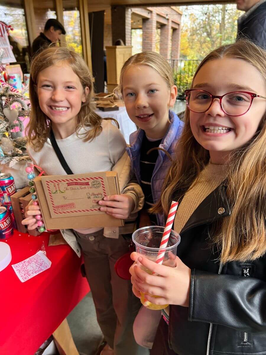 Pupils enjoying Ibstock Place School's Festive Fair.